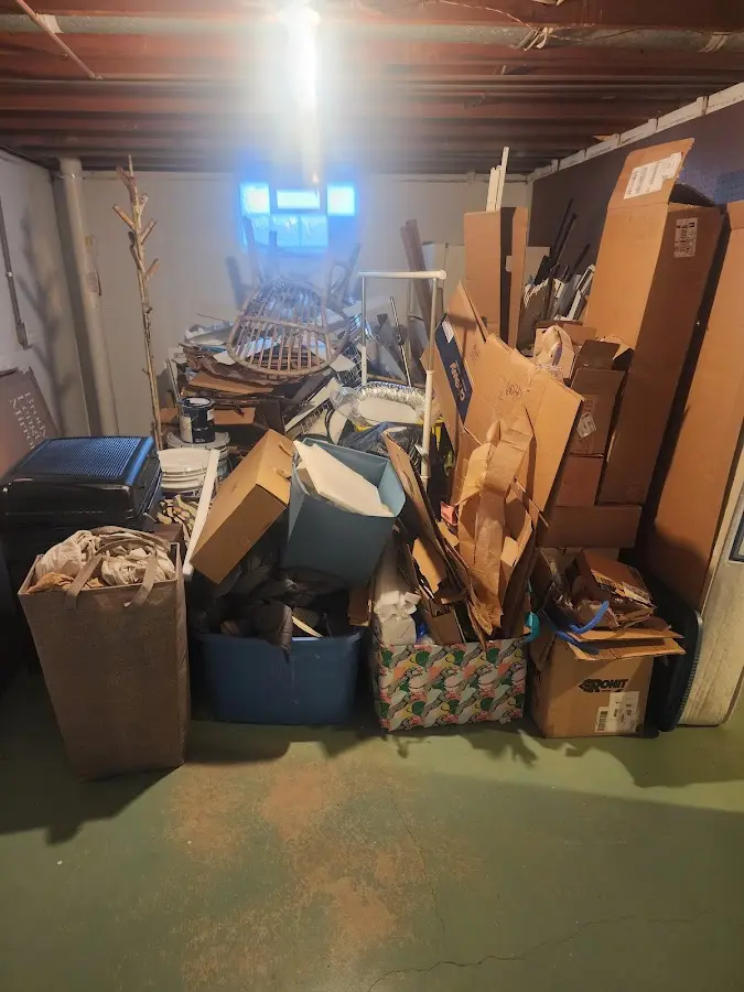 Roll-off dumpster container at job site for Concrete Dumpster Rental in Noble